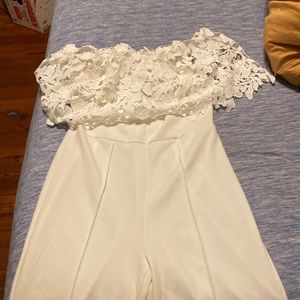 White fashion nova off the shoulder bodysuit never worn tag still on.